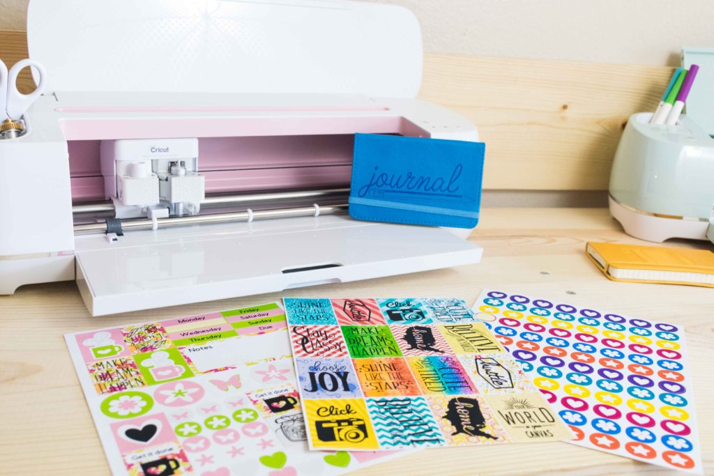 Cricut Maker and Explore with three different sticker sheets