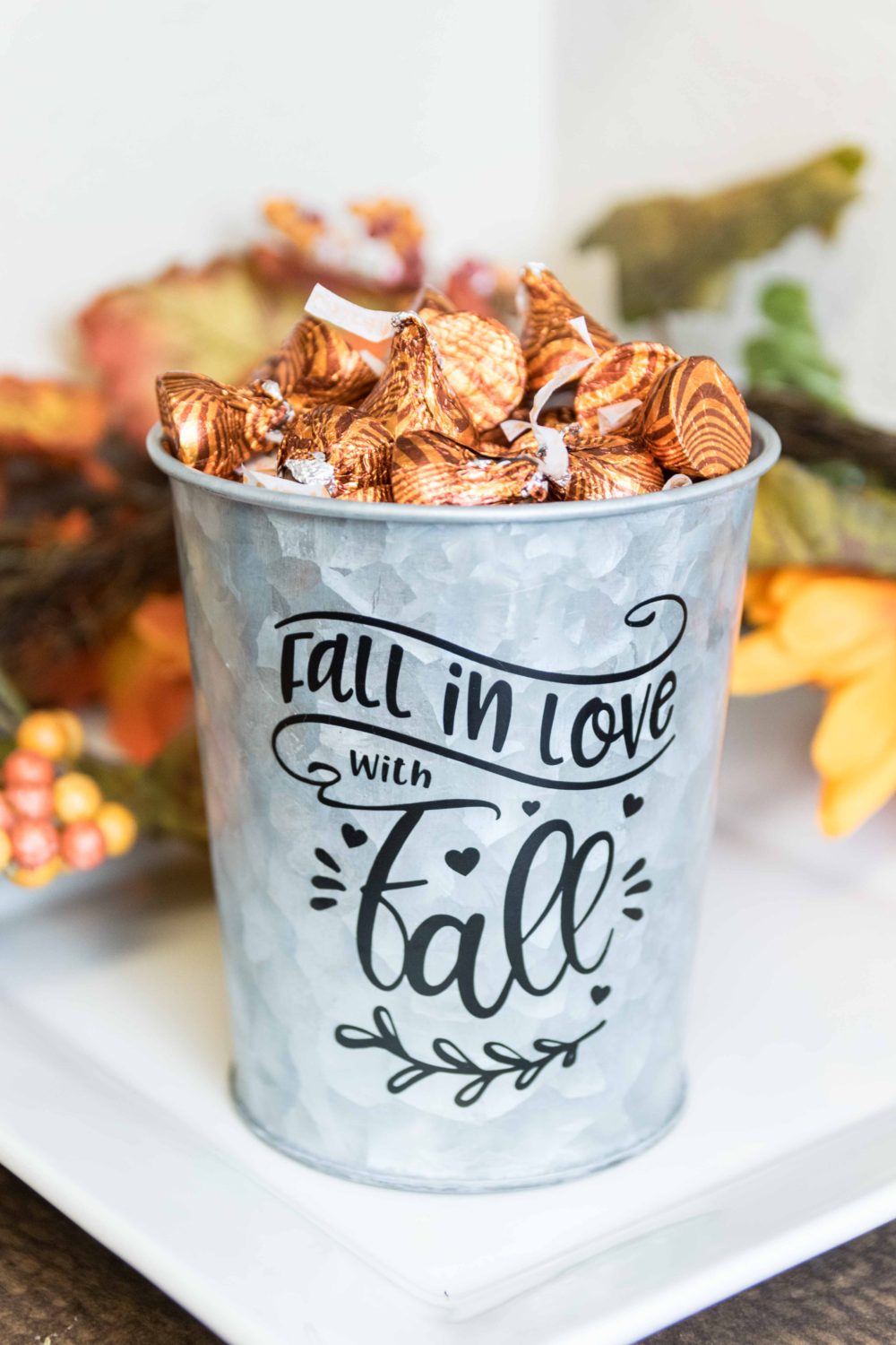 Metal Bucket decorated with black vinyl for the fall season