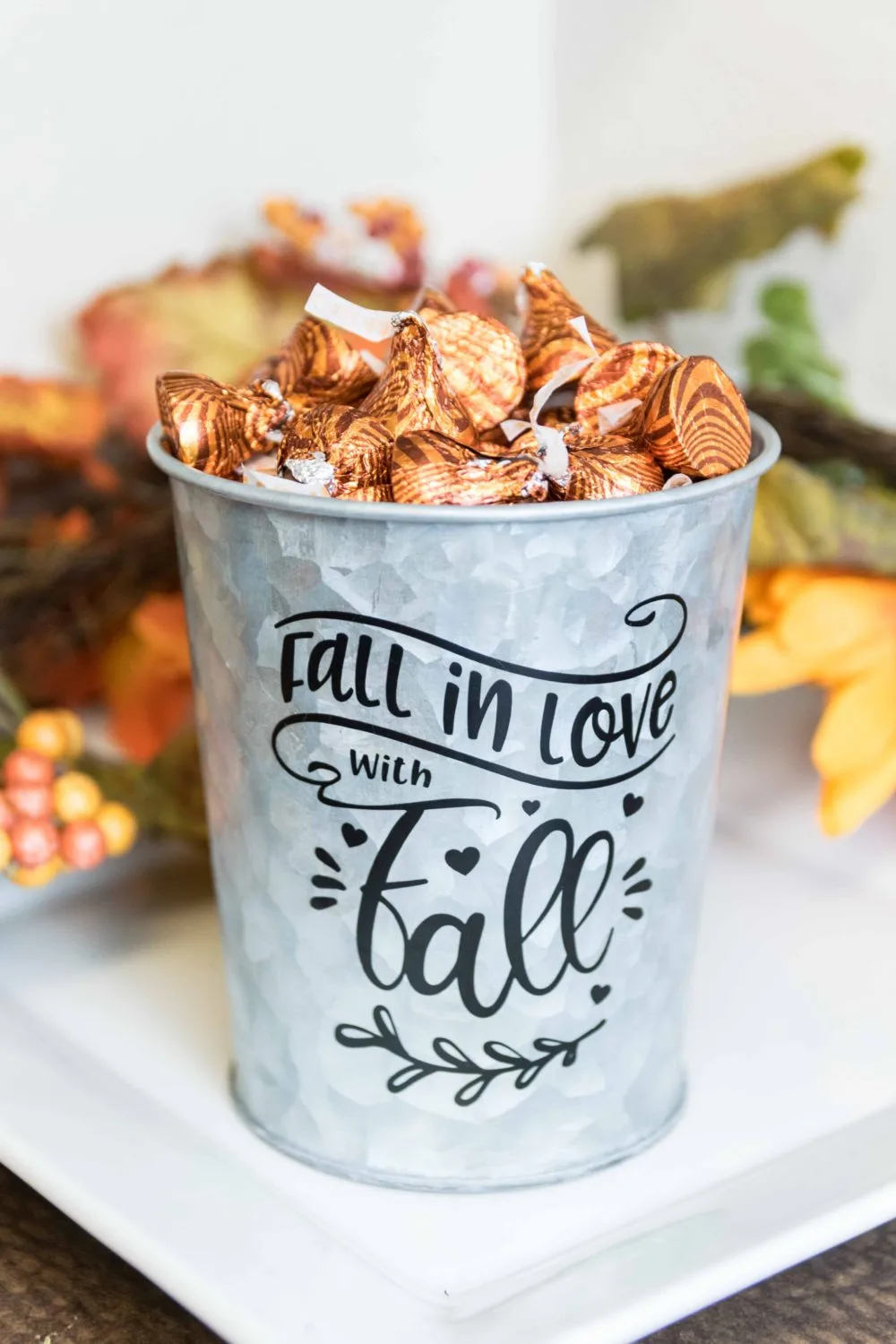 Metal Bucket decorated with black vinyl for the fall season