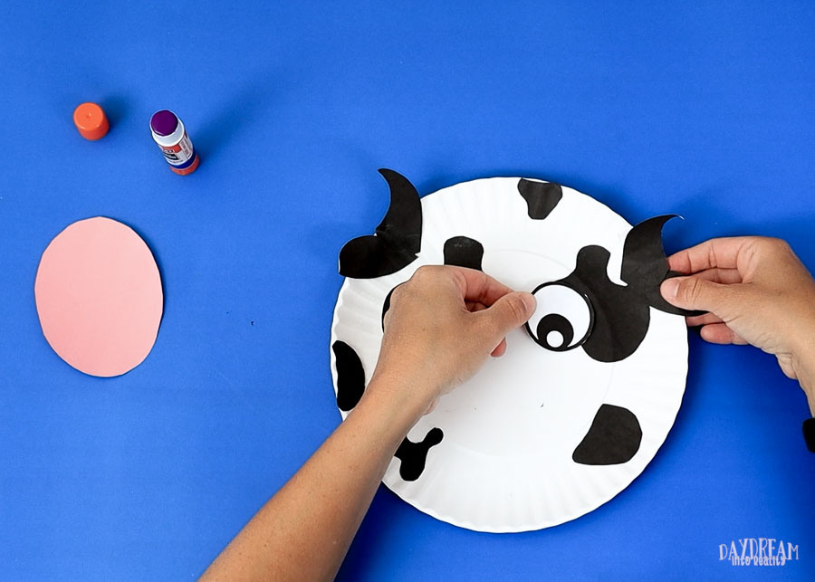 glue eyes cow paper plate craft